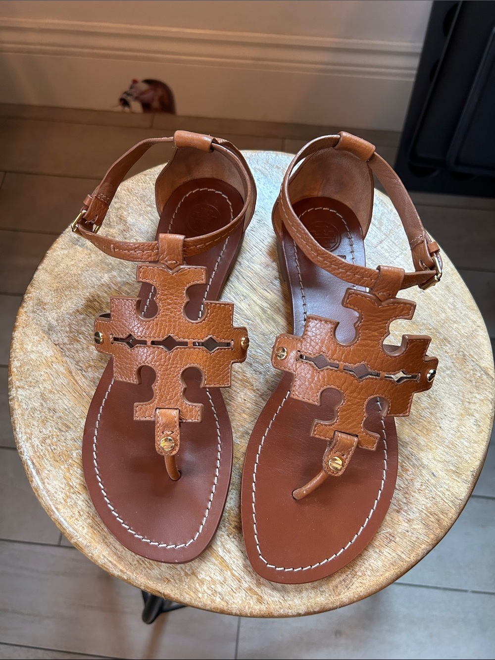 TORY BURCH Tan Brown Leather Logo T-Strap Sandals with Gold Metal Accents
